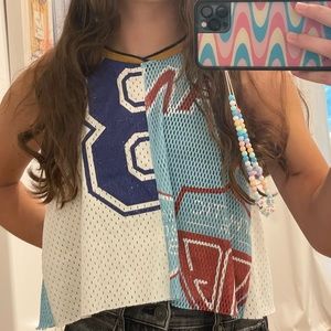 Urban Outfitters Jersey patchwork top. Cute and flattering with tags on.